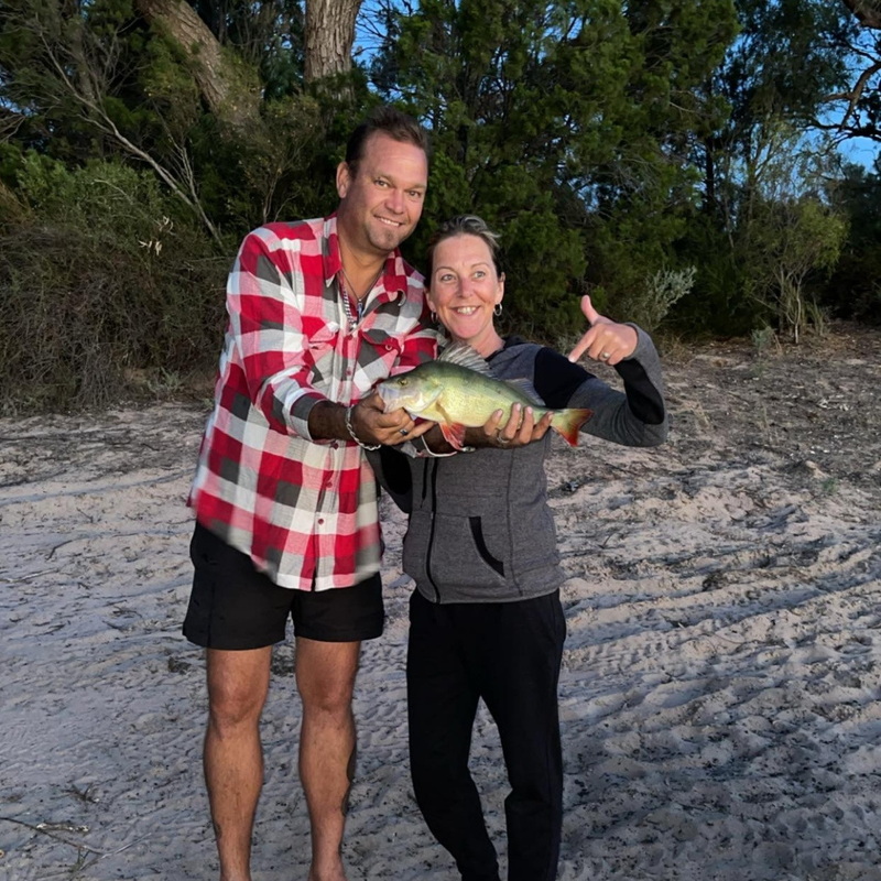 Wayne & Kerry with a 41cm Redfin. Caught on worms Jan 2024